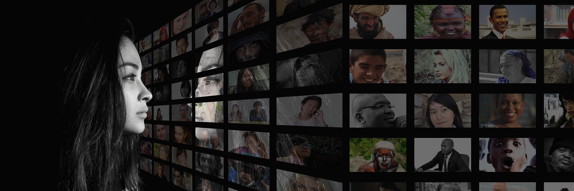 Side profile of a woman looking at a digital wall of diverse human faces, representing global connections, diversity, and the intersection of technology and humanity.