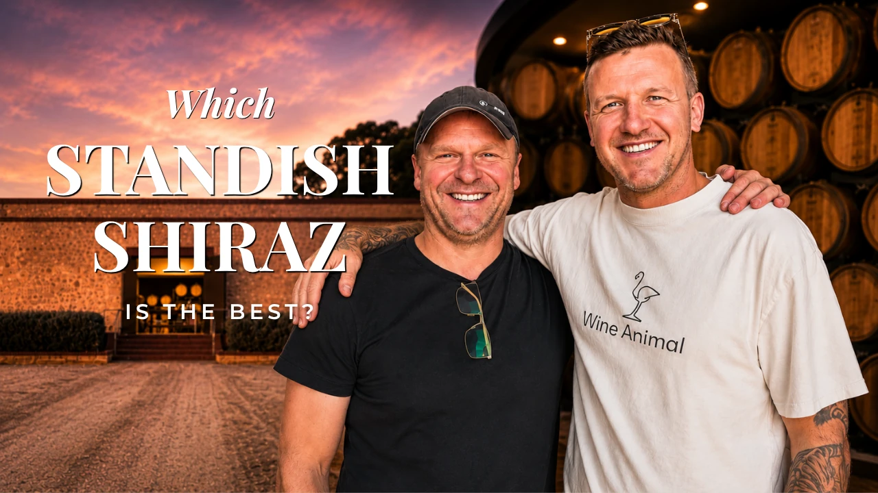 Brenden, the Wine Animal, with a Barossa winemaker in front of the barrel hall